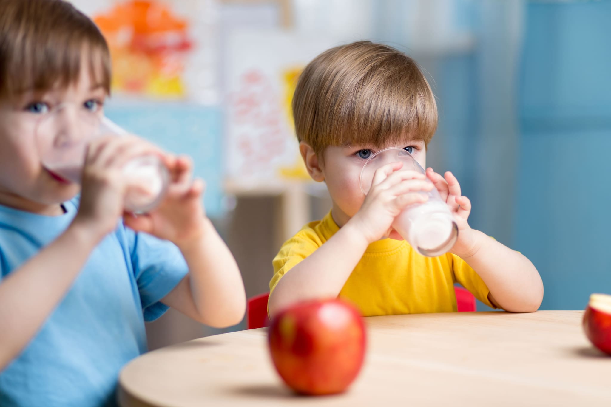 Children at school enjoying a glass of milk