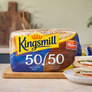 Kingsmill 50/50 soft white bread with fresh sandwich on white plate