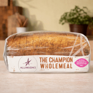 Allinson’s The Champion Wholemeal bread with sliced pieces on marble board