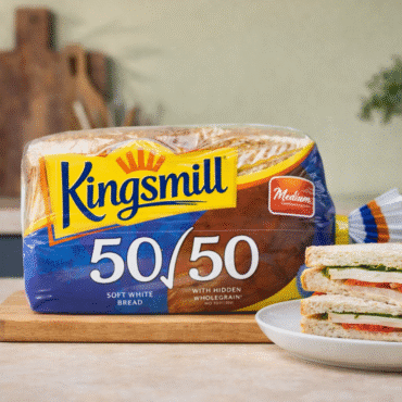 Kingsmill 50/50 soft white bread with fresh sandwich on white plate