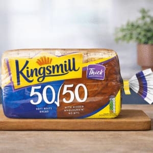 Kingsmill 50/50 soft white bread with fresh sandwich on white plate